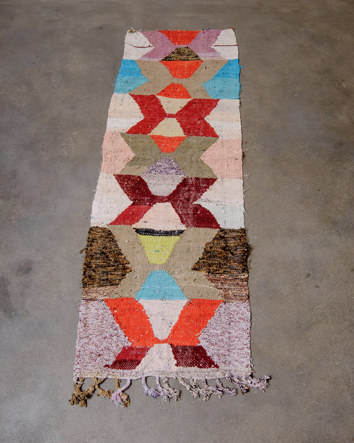 Berberlin vintage Kelim runner rug laying flat on floor.